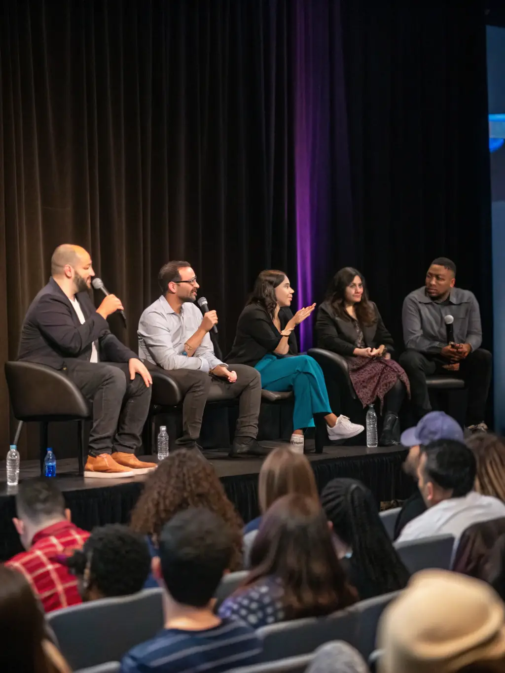 A promotional image for a special event at La Passerelle, featuring a guest speaker or artist, with details about the event and how to attend.